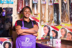 Entrepreneur Nairobi based hairdresser Nbumberi in her shop