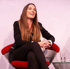 Karissa A. Breen seated on panel