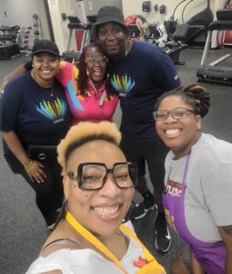 Cisco employee, Jenina John-Guobadia, and husband with MIDM crew