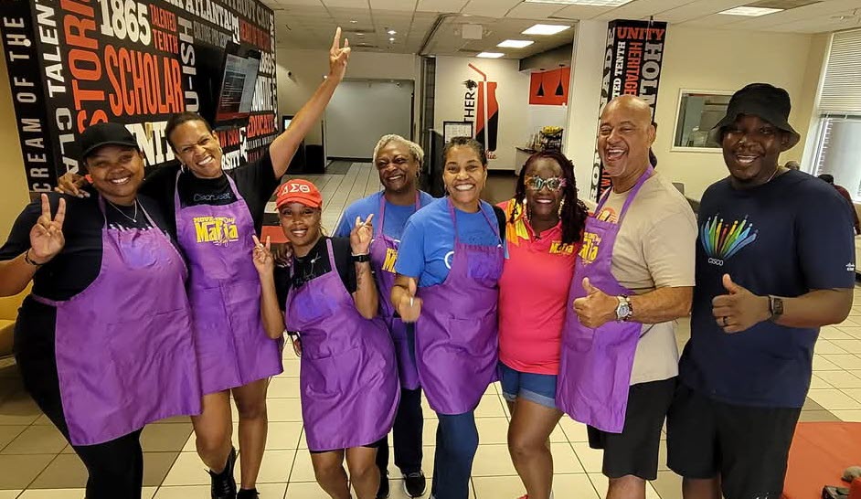 Cisco Volunteers with the Move In Day Mafia Founder, TeeJ Mercer