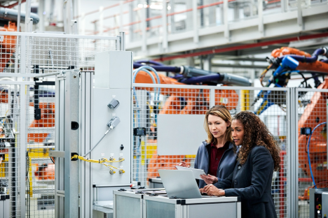 Two women working in manufacturing plant