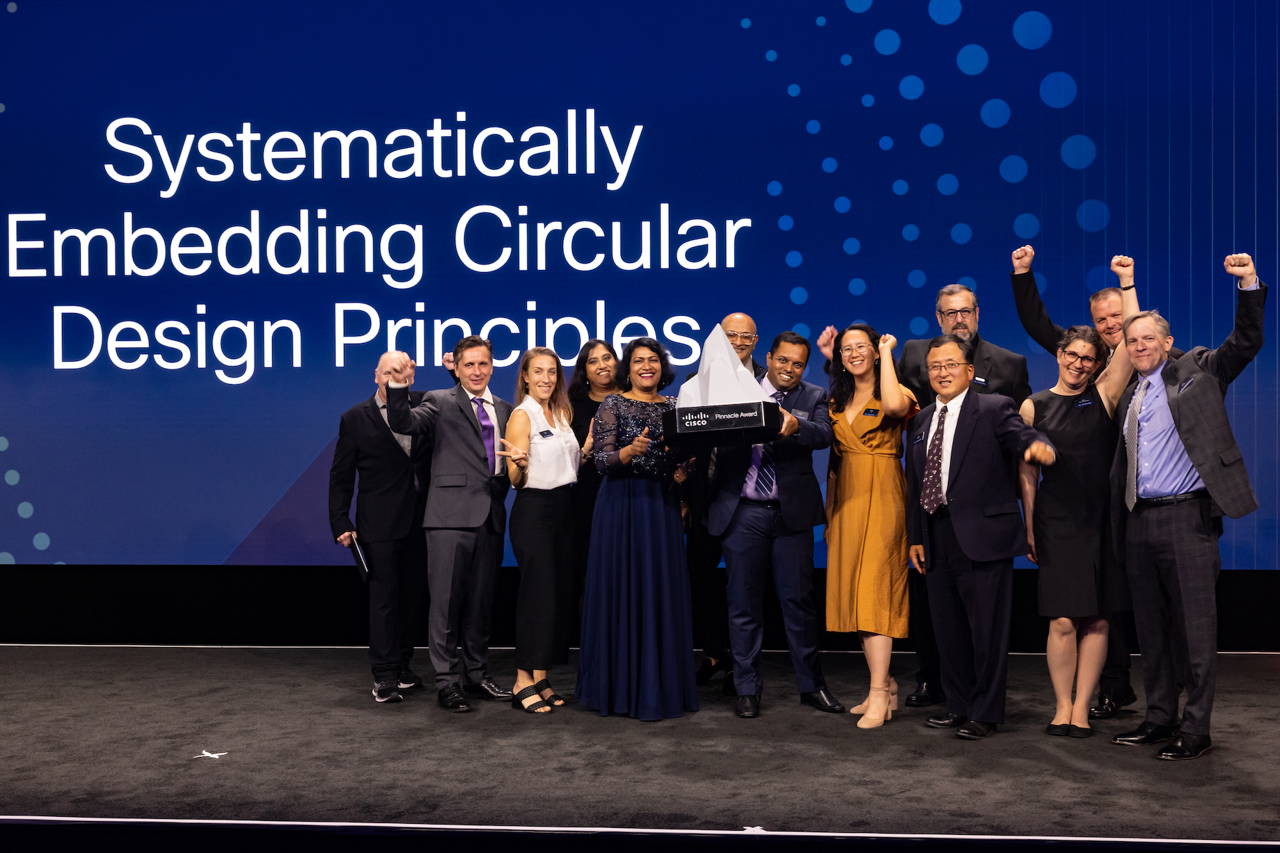 A group of Cisco employees accepting an award.