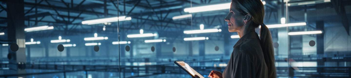 Woman stands in network center
