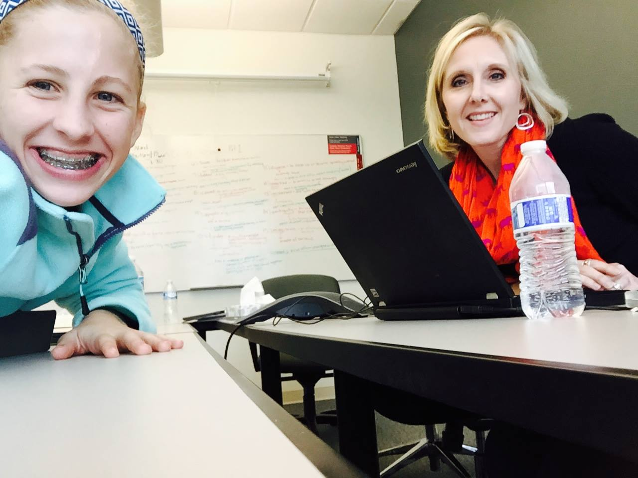 Mother and daughter at an office.