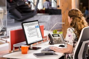 Woman using collaboration tools.