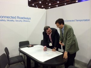 Barry Einsig, Cisco Transportation Executive and John Gillan, Sales Relationship Manager for Cisco Advanced Services prepare for a customer meeting at ITS World Congress