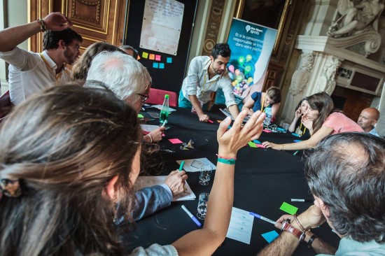 Students collaborate during the Le Defi Cisco Competition, brainstorming new ways to apply technology to global social issues